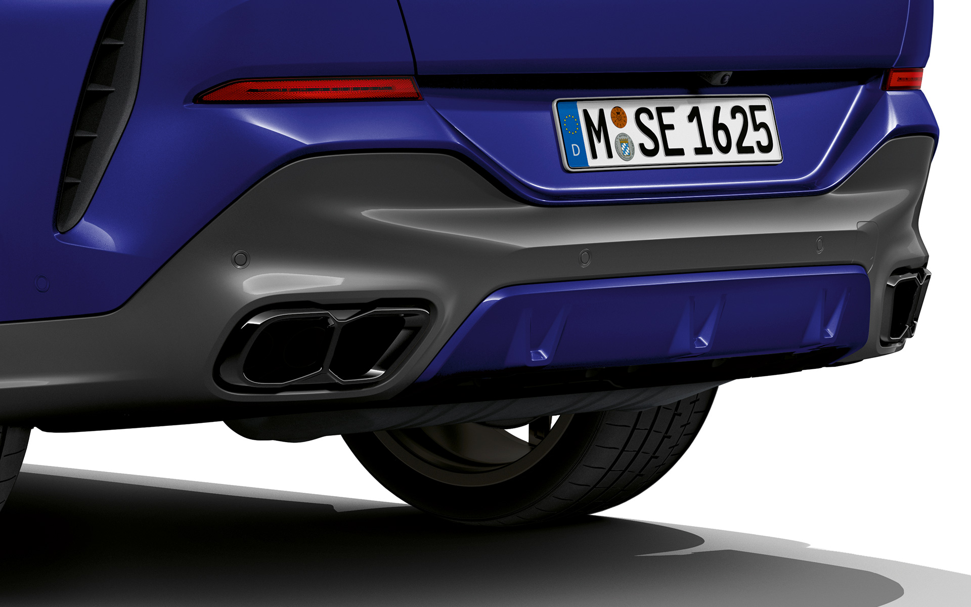 BMW X6 M60i xDrive G06 MP exhaust system close-up