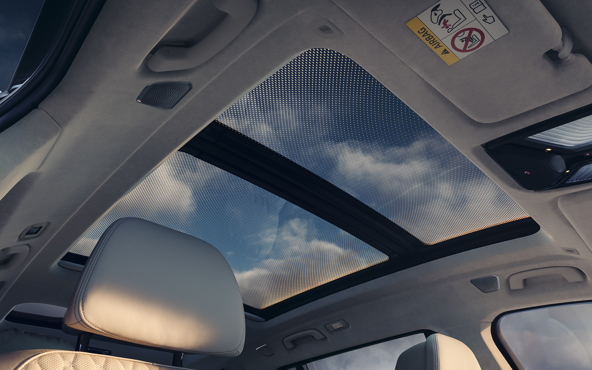 Panoramic glass sunroof view from the interior to the roof BMW X7 G07 LCI